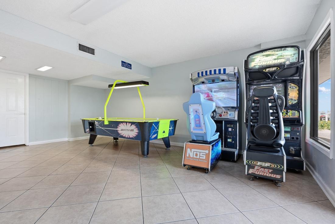 Air hockey and arcade machines in the Summit game room